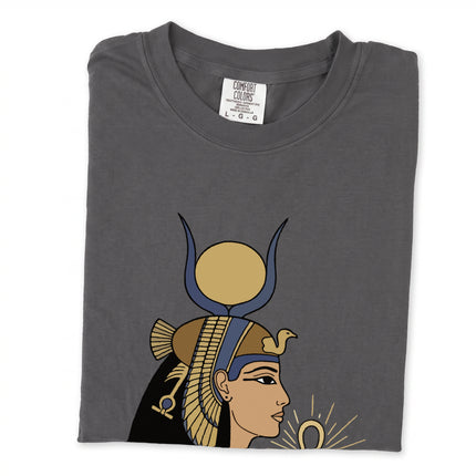Graphic tee featuring Egyptian Goddess Isis artwork and ancient hieroglyphics on a unisex shirt.