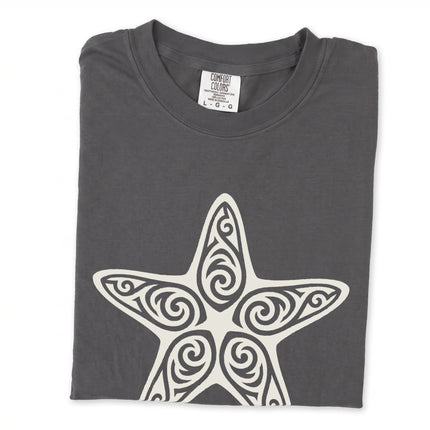 Ornate tribal starfish graphic printed on a black unisex t-shirt.
