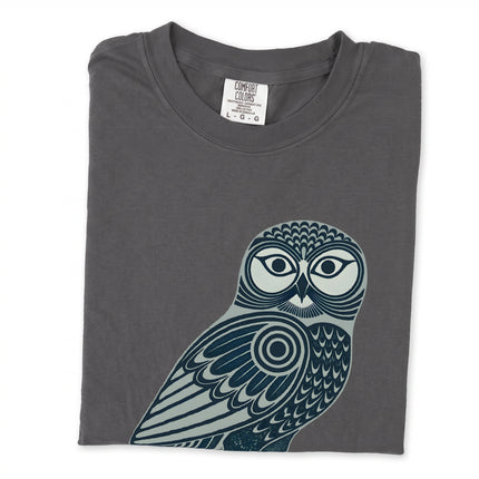 Inuit inspired owl t-shirt featuring a geometric tribal bird graphic design.