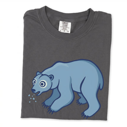 Goofy blue polar bear graphic spitting snow on an arctic themed unisex t-shirt.