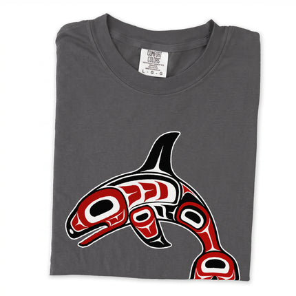 Formline whale graphic tee featuring a curved red and white design.