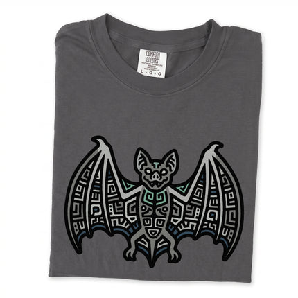Tribal blue and indigo t-shirt featuring a geometric Mayan bat symbol graphic design.