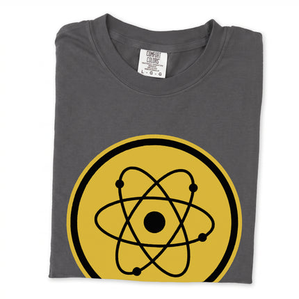 Retro gold atomic symbol science graphic t-shirt with vintage emblem design.