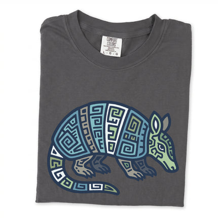 Geometric blue and green Mayan armadillo tribal graphic tee shirt featuring geometric art.