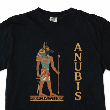 Anubis Egyptian god t-shirt featuring ancient hieroglyphic graphic art design.