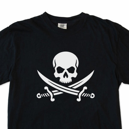 Jolly Roger skull and cutlass graphic t-shirt featuring a classic pirate symbol design.