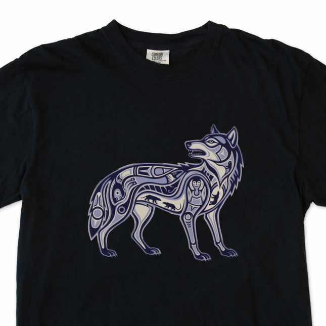 Tribal wolf symbol graphic tee shirt featuring Inuit-inspired art on black fabric.