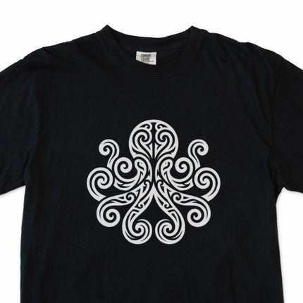 Tribal octopus and kraken graphic with celtic swirls on a t-shirt.
