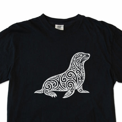 Tribal swirl seal graphic t-shirt featuring ornate marine animal art.