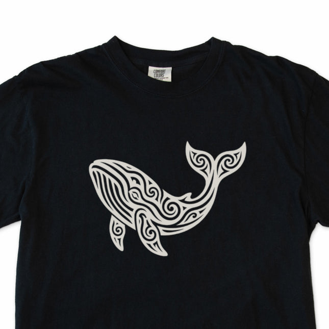 Intricate tribal whale graphic tee featuring detailed ocean animal artwork.