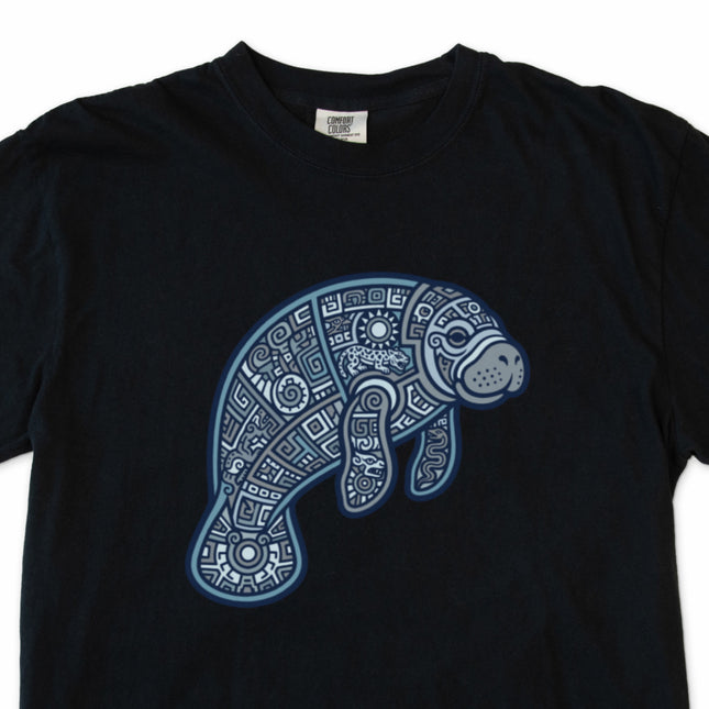 Mayan tribal manatee geometric t-shirt design featuring ocean animal art.