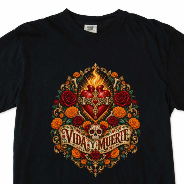 Vida y Muerte t-shirt art featuring a flaming heart, skull, and intricate floral design.