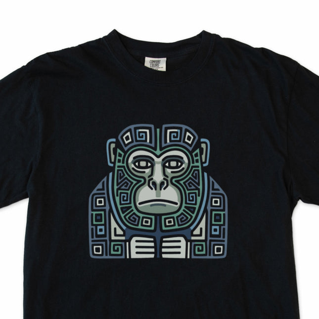 Geometric Mayan tribal monkey art t-shirt in blue and green tones.