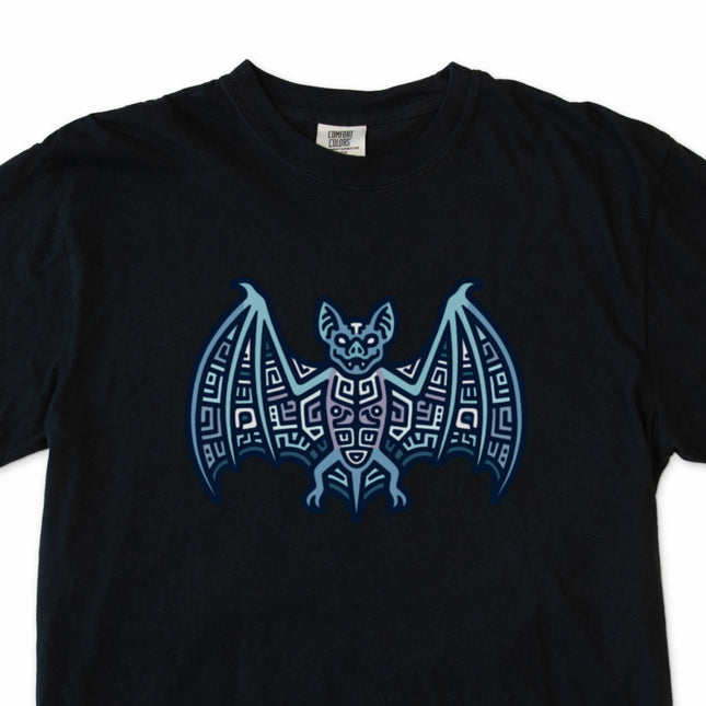 Geometric Mayan bat symbol graphic tee in blue and indigo tones.