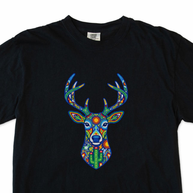 Mexican folk art t-shirt featuring a colorful Huichol deer graphic print.