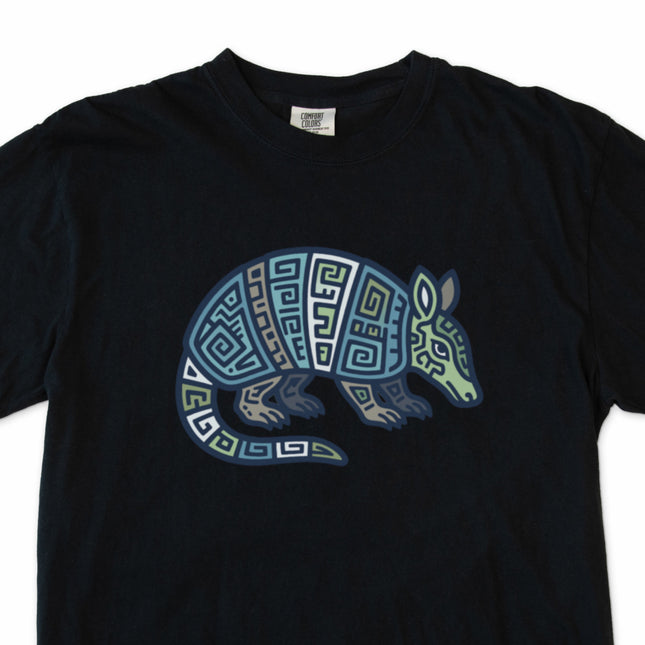 Mayan armadillo tribal art t-shirt with geometric blue and green graphic print.