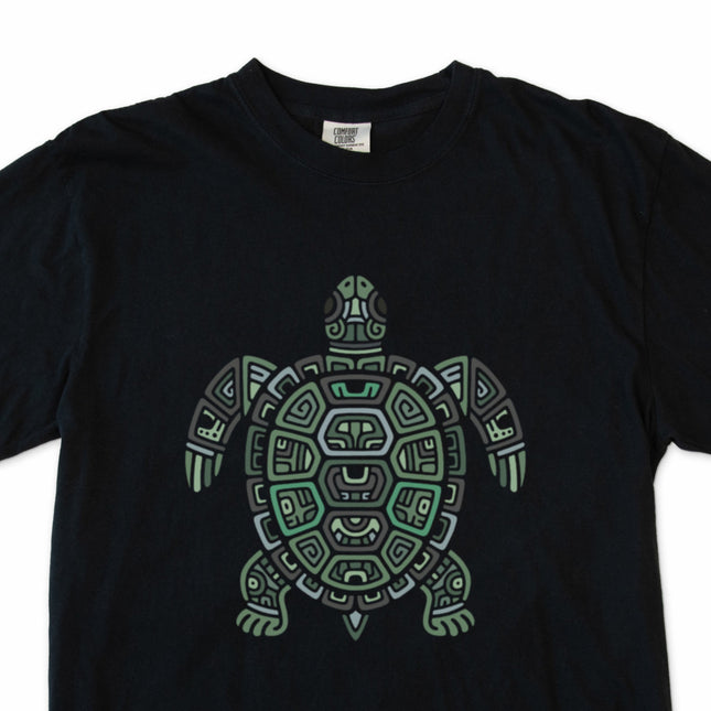 Green sea turtle graphic tee featuring Mayan tribal geometric art design.