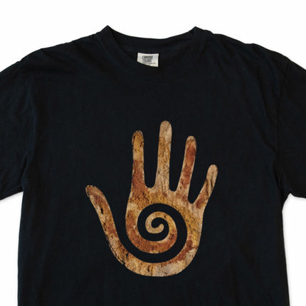 Hopi symbol t-shirt featuring an ancient spiral and hand graphic design.