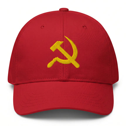 Red dad hat featuring embroidered yellow hammer and sickle communist symbol.