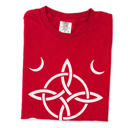Witch's knot and crescent moon symbol graphic on a black tee shirt for wiccan style.