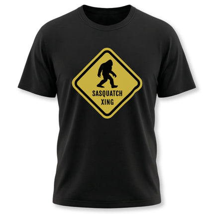 Yellow Sasquatch crossing caution sign graphic tee on a black t-shirt.