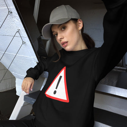 Yellow danger warning sign and exclamation mark graphic on black pullover sweatshirt.