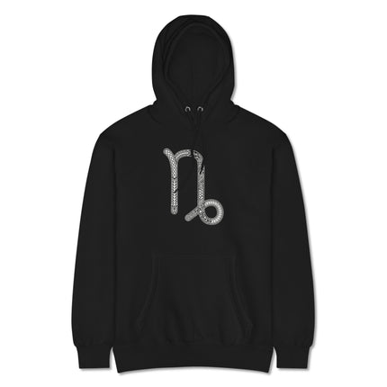 Ornate Capricorn zodiac symbol pullover hoodie featuring detailed astrology star sign print.