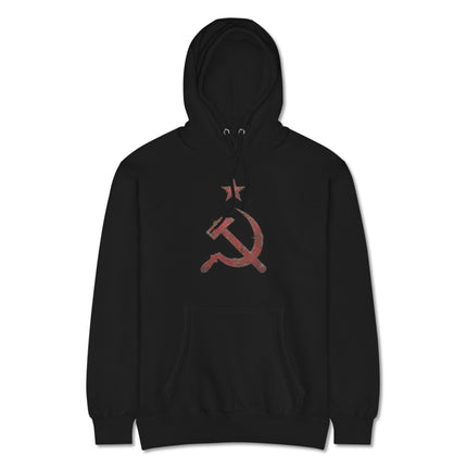 Red distressed pullover hoodie displaying the communist hammer and sickle symbol.