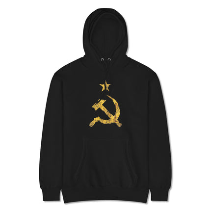 Yellow distressed pullover hoodie featuring a communist hammer and sickle emblem graphic.