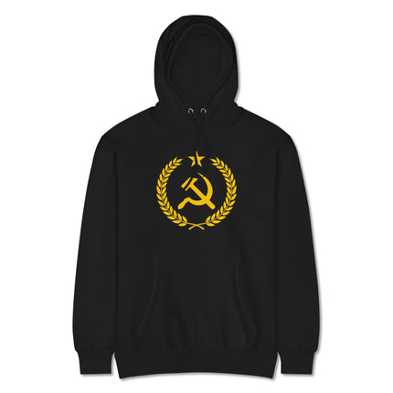 Gold hoodie print of the hammer and sickle within a laurel wreath socialist design.