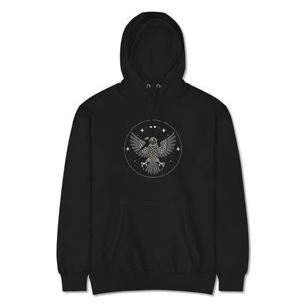 Norse raven with spread wings graphic on a unisex hoodie featuring intricate Viking knotwork pattern.