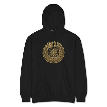 Sacred geometry feathered serpent mandala print in gold on a dark hoodie.