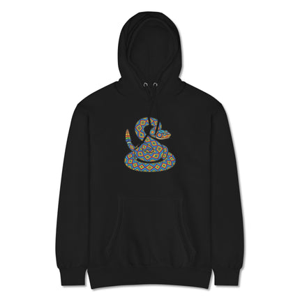 Vibrant Huichol rattlesnake folk art print on a geometric pullover hoodie.