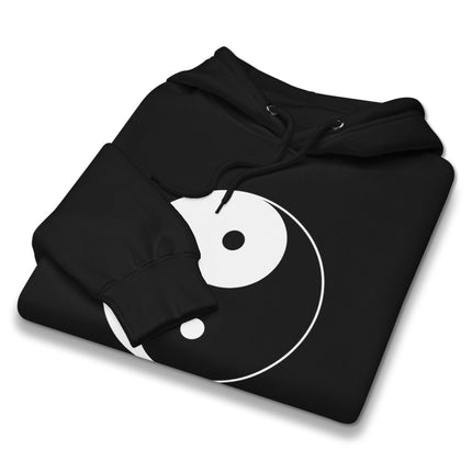 Black hoodie featuring a yin yang zen symbol graphic print of cosmic balance.