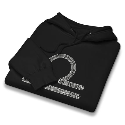 Intricate Libra zodiac scales symbol on a comfortable pullover hoodie.