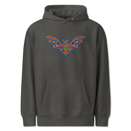 Colorful Huichol bat art on a pullover hoodie featuring vibrant Mexican indigenous folk patterns.