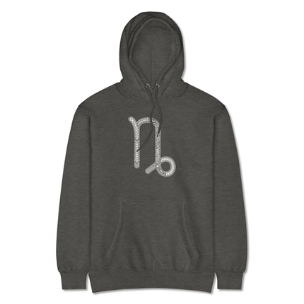 Ornate Capricorn zodiac symbol graphic on a pullover astrology star sign hoodie.