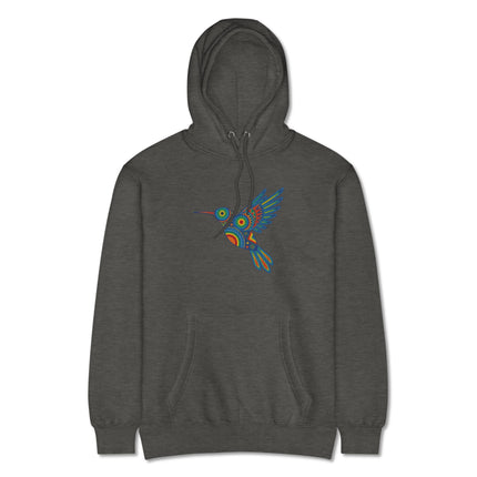 Vibrant Huichol hummingbird art graphic on a colorful pullover hoodie.