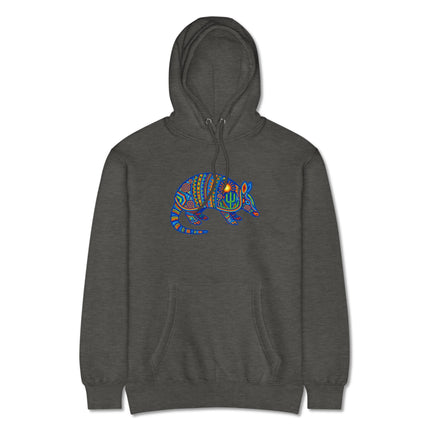 Colorful Huichol art pullover featuring tribal designs of armadillos, suns, and cacti.