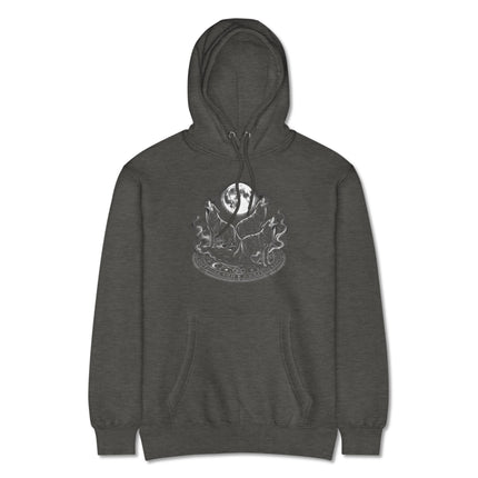 Howling wolves and full moon graphic printed on a cozy canine spirit hoodie.