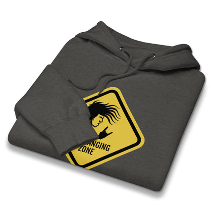 Black pullover hoodie featuring "Headbanging Zone Rock On Metal" warning sign graphic print.