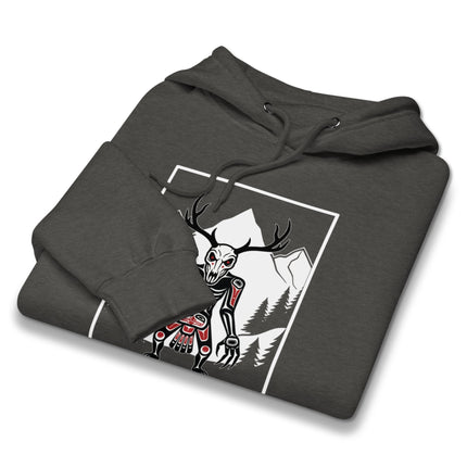 Wendigo skull and antler graphic on a dark pullover hoodie featuring cryptid tribal forest art.