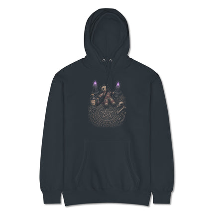 Gothic hoodie featuring a dark magic ritual table, occult pentagram, and spooky doll design print.