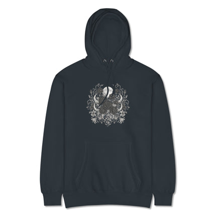 Witchy celestial design featuring black roses and crescent moons on a black hoodie.