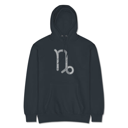 Ornate Capricorn zodiac symbol pullover hoodie with astrological star sign print.