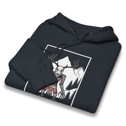 Black pullover hoodie featuring a tribal cryptid Wendigo skull and antler forest graphic print.