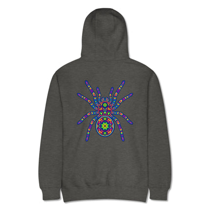 Colorful Huichol tarantula spider art pullover with Mexican folk style printing.