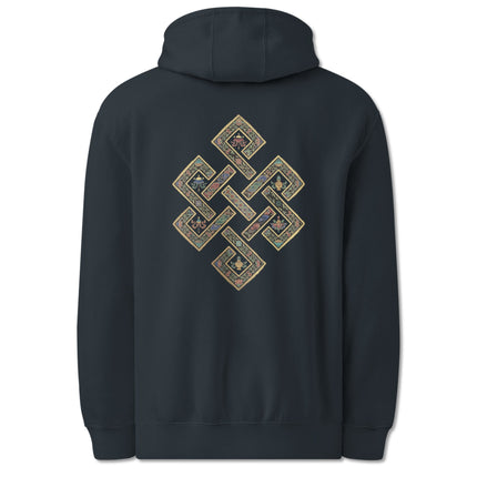 Golden Endless Knot symbol printed on the back of a pullover hoodie. Tibetan Buddhist art design.