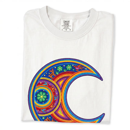 Colorful t-shirt featuring a Huichol-inspired crescent moon graphic in vibrant Mexican art style.