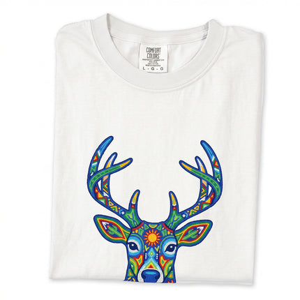 Colorful Huichol deer graphic tee inspired by traditional Mexican folk art design.